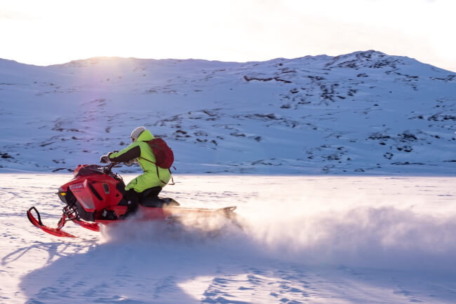 Enjoy Snowmobile Shuttle in the Backcountry